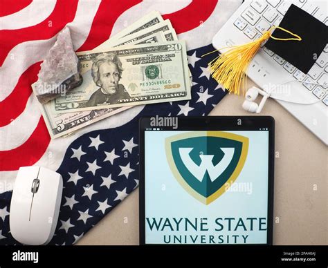 In this photo illustration, Wayne State University logo seen displayed ...