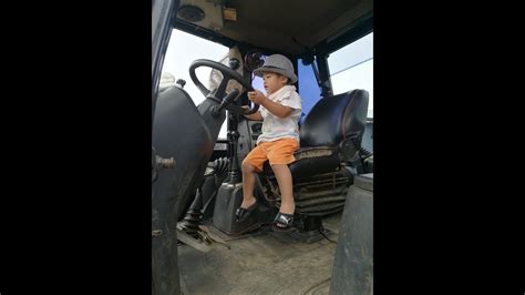 2 year old boy driving a jcb machine - YouTube