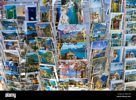 colourful postcards in rack, locarno, switzerland Stock Photo - Alamy