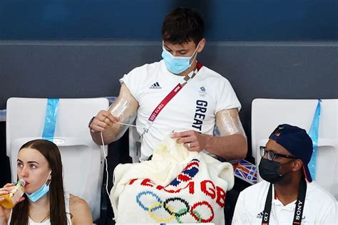 His dive won gold. His knitting won the internet.