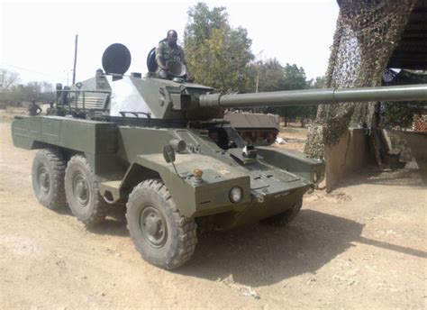 A Nigerian Army ERC-90 heading out on a patrol with Saurer 4K APC's and ...