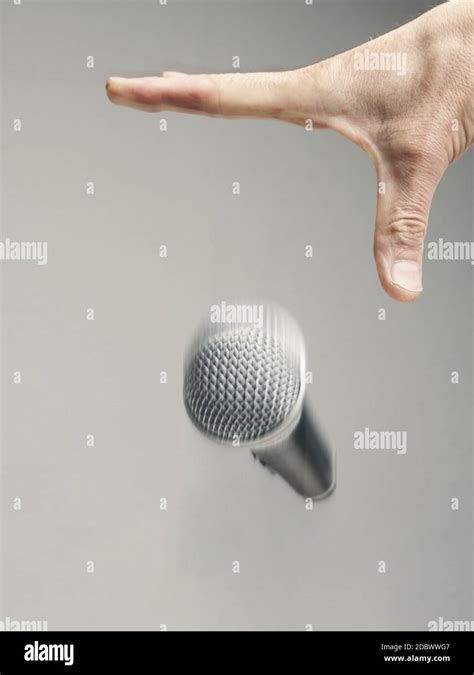 Speaker drops his microphone at the end of the speech. Mic drop concept Stock Photo - Alamy