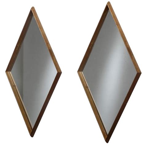 A 1950s Pair of Gilt Diamond Shaped Mirrors at 1stDibs