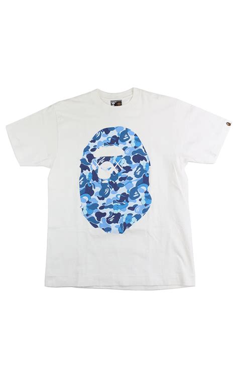 Bape x Kaws ABC Blue Camo Big Ape Logo Tee White | SARUUK