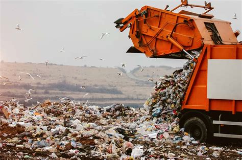 Garbage truck dumping the garbage on a landfill - Fire Systems, Inc.