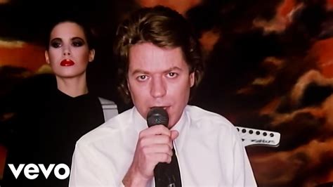 Robert Palmer - Addicted To Love (Official Music Video) Chords - Chordify