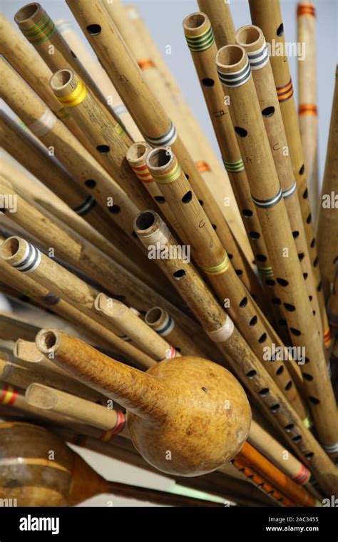 Bamboo flutes for sale at the Ghats in Varanasi India Stock Photo - Alamy