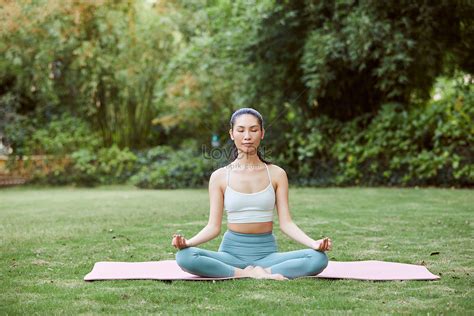 Female Doing Yoga Poses On The Grass Picture And HD Photos | Free Download On Lovepik