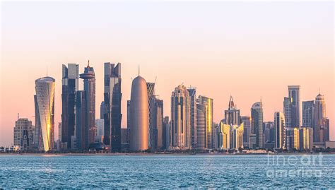 Doha skyline at sunrise - Qatar Photograph by Matteo Colombo - Fine Art America