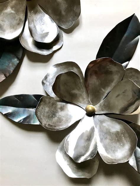 Stainless Steel Magnolia | Metal flowers, Sheet metal art, Metal crafts