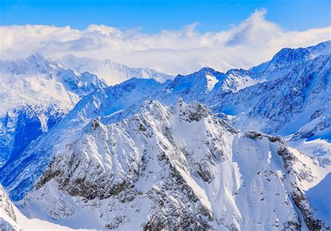 Mountain Ranges Covered in Snow · Free Stock Photo