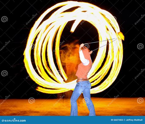 Fire Dancer Silhouette On Sunset Sky Background Stock Image | CartoonDealer.com #43544227