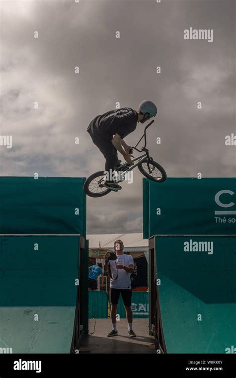 BMX tricks on a half pipe Stock Photo - Alamy