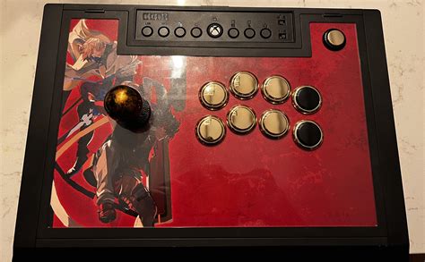 Customized Hori Alpha with some Guilty Gear Strive art and new buttons ...