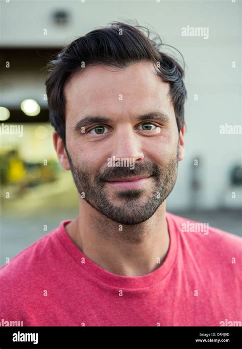 Man smiling outdoors Stock Photo - Alamy