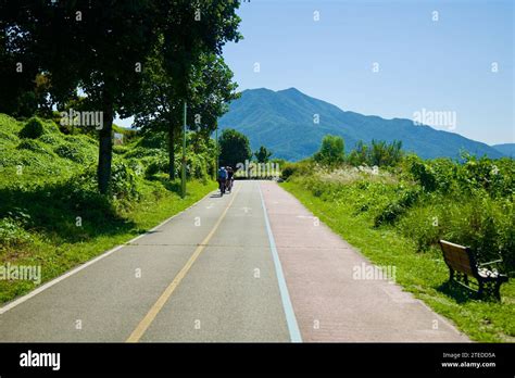 Namyangju City, South Korea - September 30, 2023: Distant cyclists ...