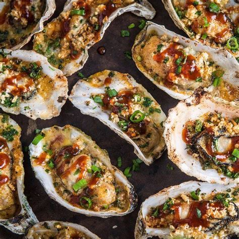 These BBQ oysters are shucked, sprinkled with breadcrumbs and garlic onion butter, grilled, then ...