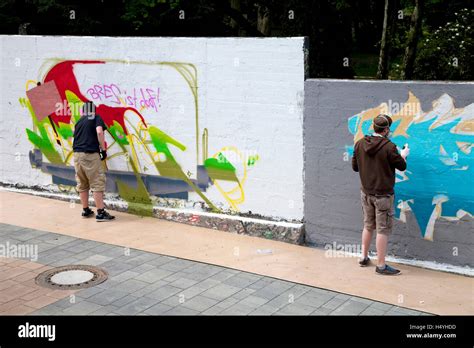 Graffiti artists at the Wall of Fame, wall covered in graffiti, Streetlifeday, Local Heroes Week ...