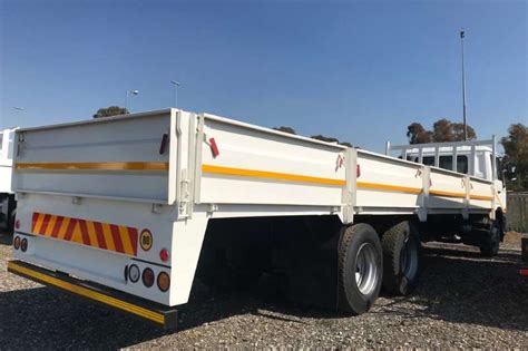 2009 Nissan UD90 Dropside Tag Axle Dropside Truck Trucks for sale in Gauteng on Truck & Trailer