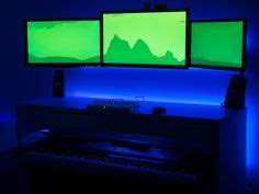 Beautiful floating multi-monitor workstation setup with LED accent lighting Ikea Micke Desk ...