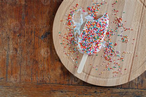 Ice Cream with Rainbow Sprinkles Topping 722987 Stock Photo at Vecteezy