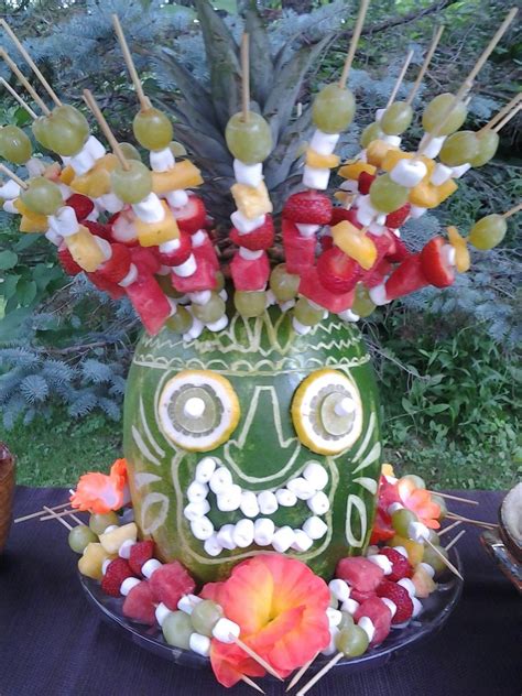 Tiki Watermelon | 1000 | Luau theme party, Luau birthday party, Backyard party food