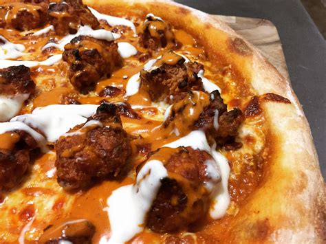 Buffalo chicken pizza with blue cheese and fried boneless wings : r/Pizza