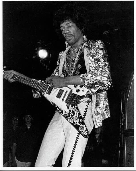 Jimi Hendrix With A Flying V by Tom Copi