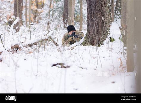 U.S. Army Cpl. Eric Spagnuolo practices squad movement techniques with fellow Soldiers with ...