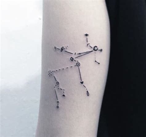 Sagittarius constellation tattoo on the arm - Tattoogrid.net