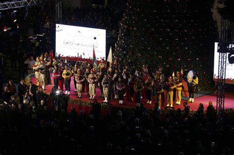 Thousands gather in Bethlehem for Christmas tree lighting. - Holy Land ...