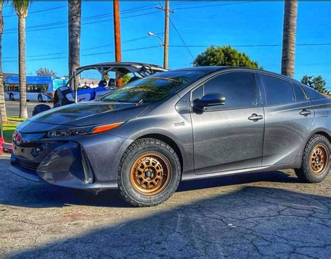 Prius PRIME lifted with the 2" inch lift kit looks ready for battle! : r/priusoffroad