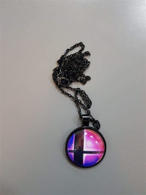 Super Smash Bros Ball Pink and Black Necklace - قلادة | Store 974 ...