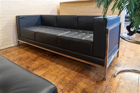 Mid-Century Modern Black Leather Sofa • Peartree Office Furniture