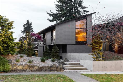 A shed roof and metal siding create a modern house. Corrugated Metal ...