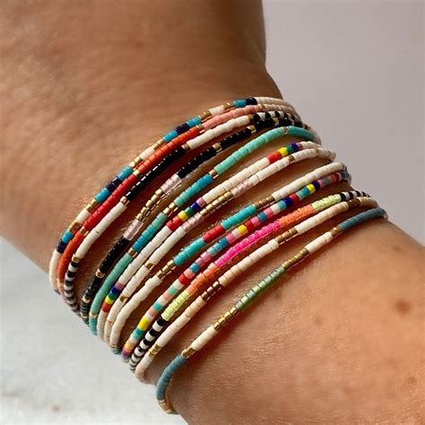 These fun delicate beaded bracelets are fully adjustable making them ...