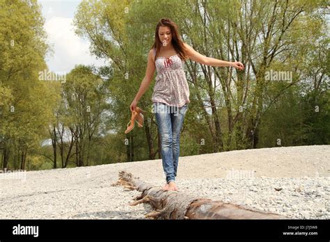 spring barefoot outdoor walk balance driftwood girl girls nature woman ...