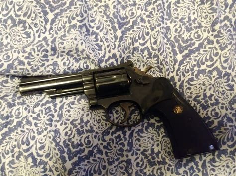 Can anyone tell me what brand of revolver this is, my cousin just got ...