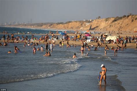 Palestinians return to Gaza City's beaches | Daily Mail Online