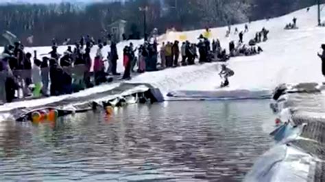 Crowd Explodes With Laughter At Snowboarder's Pond Skim Fail (Watch ...