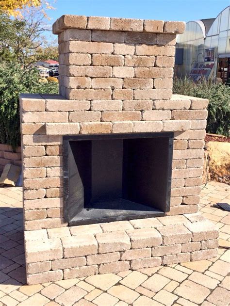 Simple and elegant outdoor fireplace kit by Whiz-Q Stone. This kit easily stacks together to ...