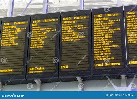 Arrivals Departure Board in King`s Cross Train Station, London, England ...