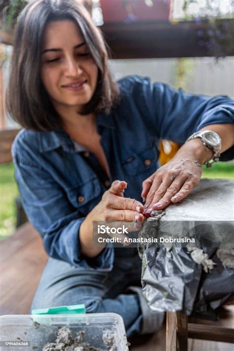 Beautiful Woman Making Papier Mache Vase On The Porch Of Wooden House ...