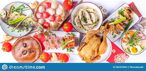 Chinese Lunar New Year Dinner Table Stock Photo - Image of baked, fortune: 262323904