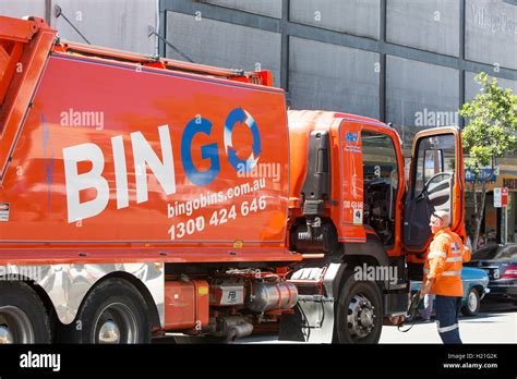 Bingo bins garbage waste truck and driver in Sydney,Australia Stock ...