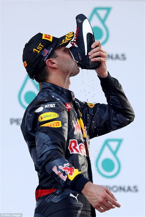 Daniel Ricciardo wins the Malaysia F1 grand prix and celebrates in ...