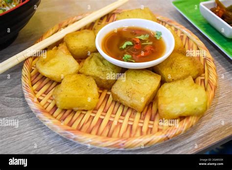 Myanmar or Burmese street food called Fried tofu recipe. Lateral view Stock Photo - Alamy