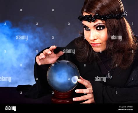 Woman with crystal ball. Fortune telling Stock Photo - Alamy