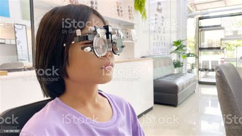 Eye Test Child Wearing Eyeglasses For Medical Eye Test In Clinic Eye ...