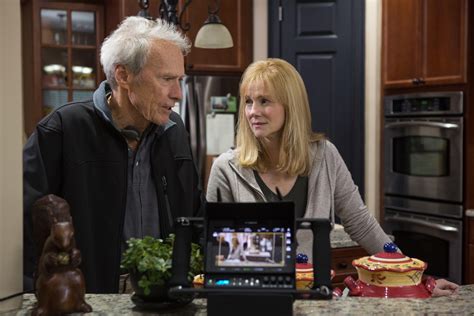 Co-producer/director Clint Eastwood talks with Laura Linney on the set of "Sully", 2016. | Clint ...